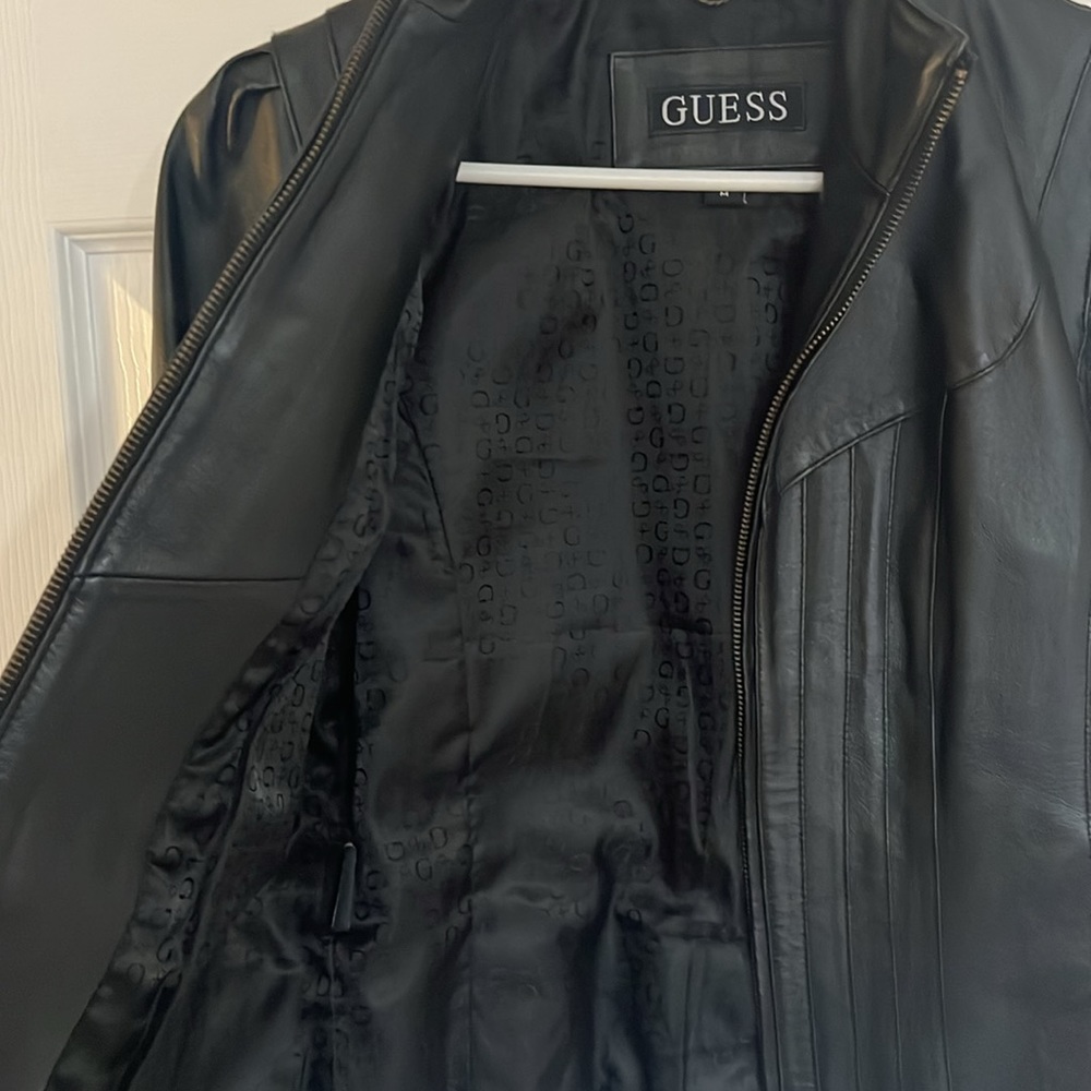 Gently used Guess black leather jacket. Size M zippered sleeves - Picture 2 of 9